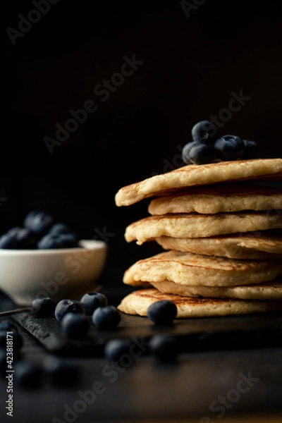 Fototapeta Stack of blueberry pancakes with syrup and fresh blueberries
