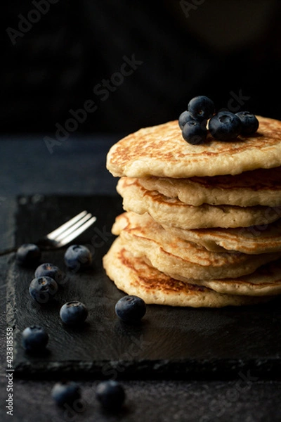 Fototapeta Stack of blueberry pancakes with syrup and fresh blueberries