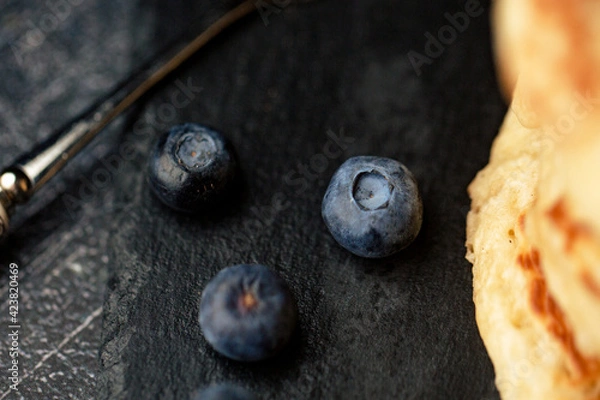 Fototapeta Stack of blueberry pancakes with syrup and fresh blueberries
