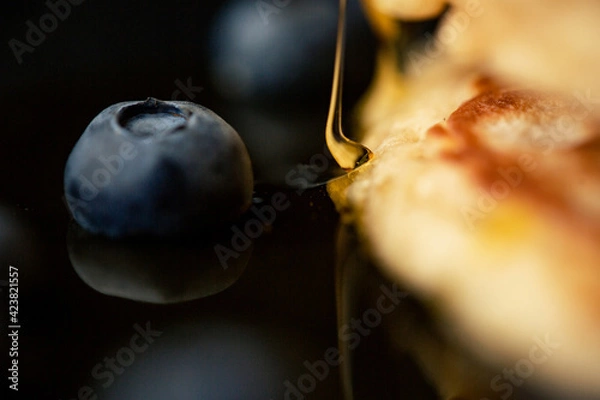 Fototapeta Stack of blueberry pancakes with syrup and fresh blueberries