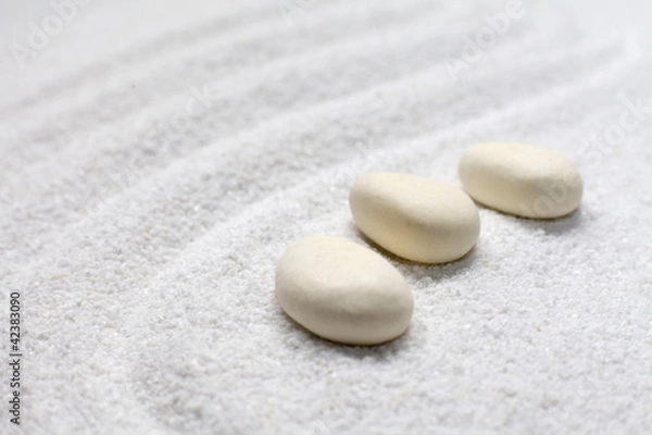 Obraz trois cailloux sur sable fin