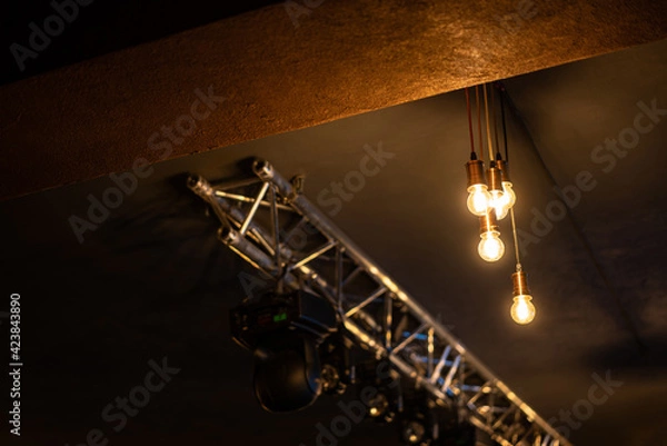 Fototapeta Ceiling lights in the dark room