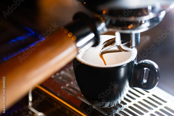 Fototapeta Coffee machine in the dark bar