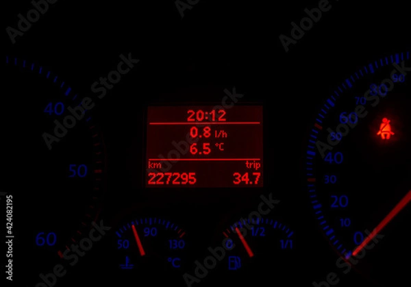 Fototapeta car instrument cluster, backlight at night, blue and red