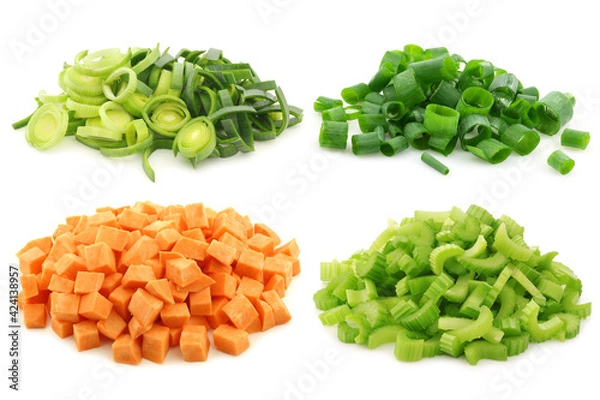 Fototapeta Cut leek, celery, spring onion and brunoise cut sweet potato pieces on a white background