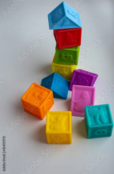 Obraz Multi-colored silicone cubes for children for games. Isolate