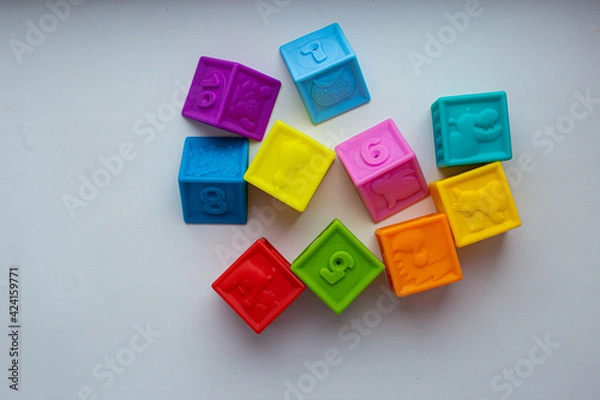 Obraz Multi-colored silicone cubes for children for games. Isolate