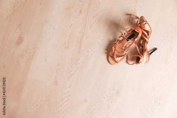 Obraz Women's shoes for latin dance and tango on the dance floor. Dance lessons.