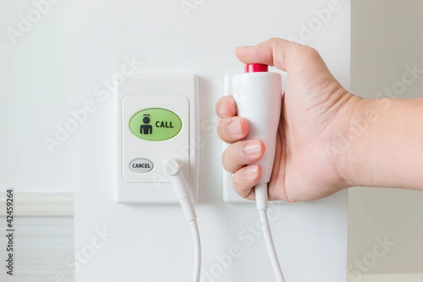 Fototapeta hand pushing nurse call button