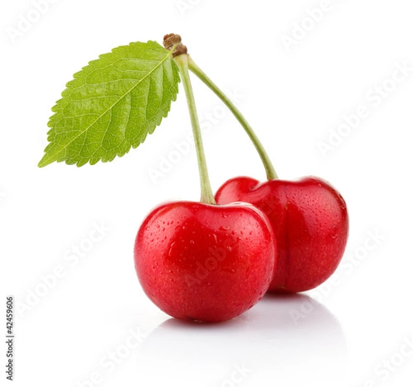 Obraz Ripe cherry berries with green leaf isolated on white