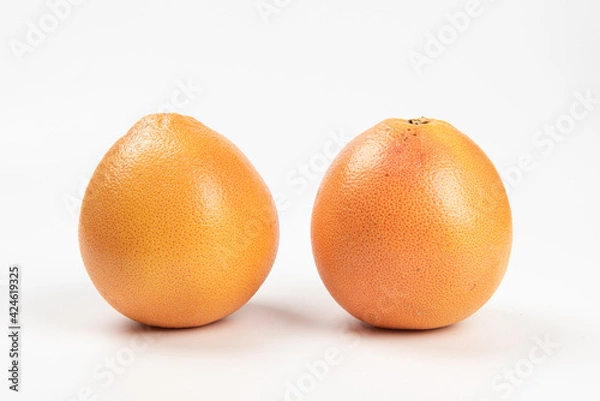 Fototapeta Fresh grapefruit isolated on white background