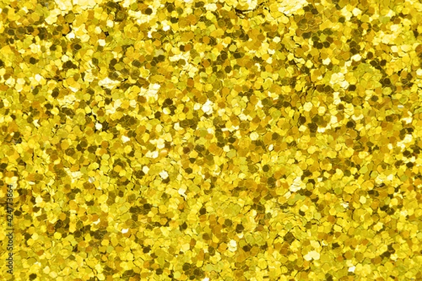 Fototapeta Glitter background in new stylish tone, your texture in gold tone as part of your holiday desktop.