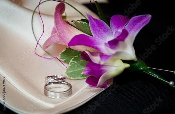 Fototapeta Wedding ring and flowers