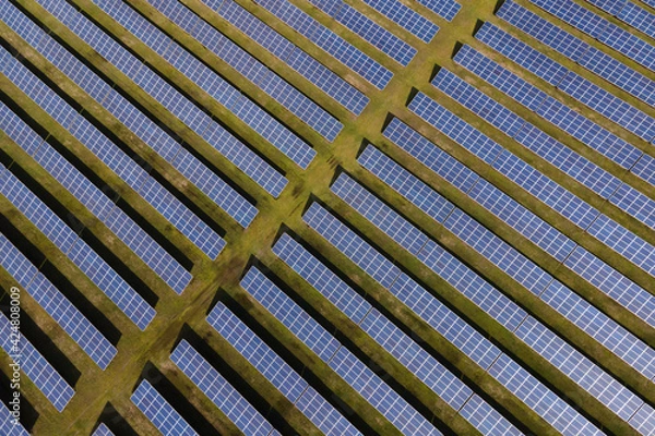 Obraz Aerial shot top view of solar panel photovoltaic farm