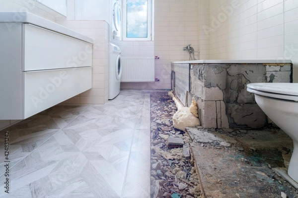 Fototapeta Bathroom renovation before and after. Laying new stone tiles in modern math room. Comparison view of floor reconstruction