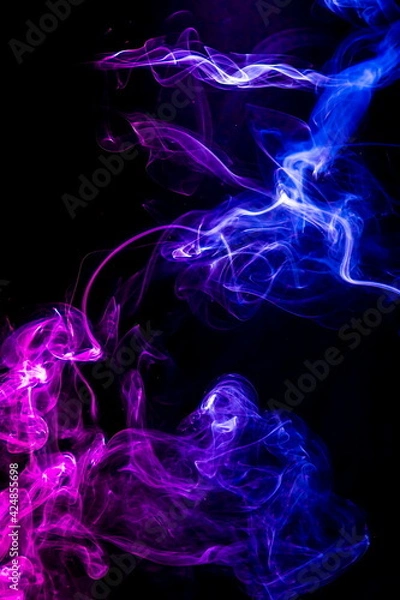 Fototapeta Colored smoke on black background