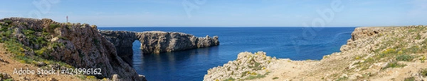 Fototapeta Panoramic view of Pont d'en Gil, in Menorca (Balearic Islands, Spain), in a sunny day with blue sky