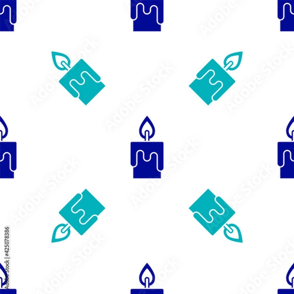 Fototapeta Blue Burning candle icon isolated seamless pattern on white background. Cylindrical candle stick with burning flame. Vector