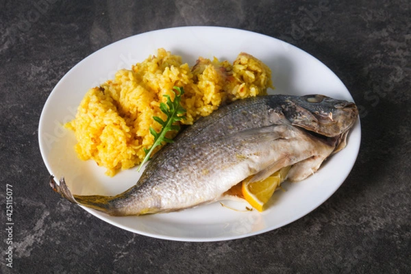 Obraz Steamed Dorada fish with rice