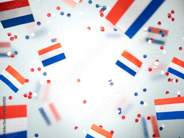 Fototapeta Netherlands King's birthday, liberation day. flags on a foggy background. The concept of freedom, patriotism and memory. National Unity and Solidarity Day