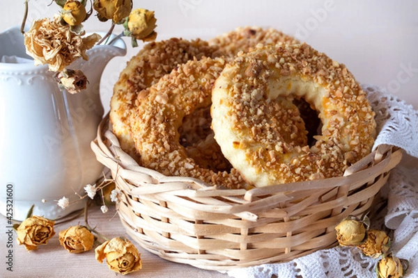 Fototapeta Peanut-nut pastries. Cookie rings with shortbread dough on a light background