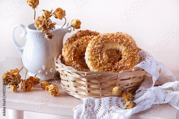 Fototapeta Peanut-nut pastries. Cookie rings with shortbread dough on a light background