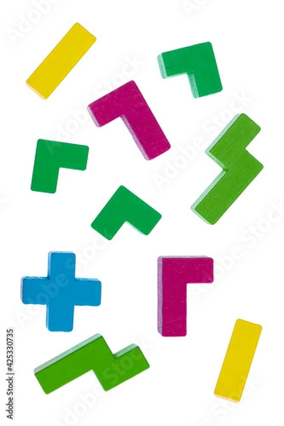 Fototapeta Wooden colored tetris figurines on a white background, isolated