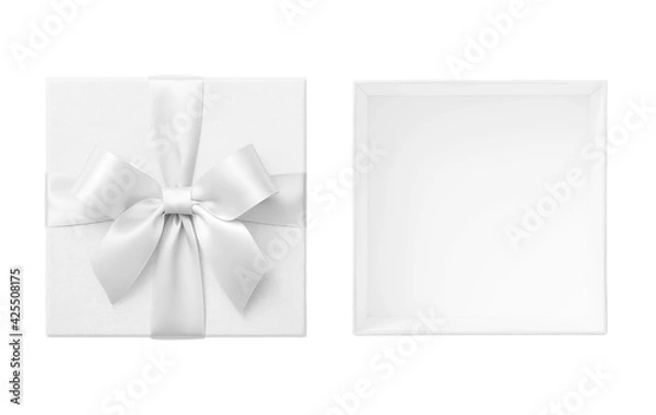 Obraz Open white gift box with lid and white bow cut out on white background, wedding present top view