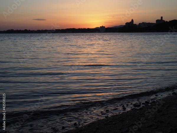 Obraz 夕日に照らされた湖