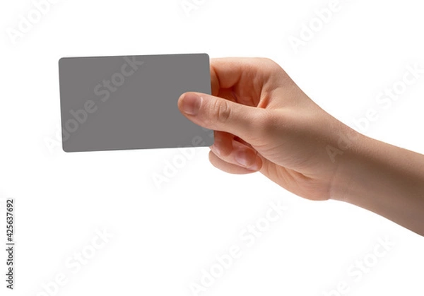 Obraz The right hand holds a plastic card on a white background.