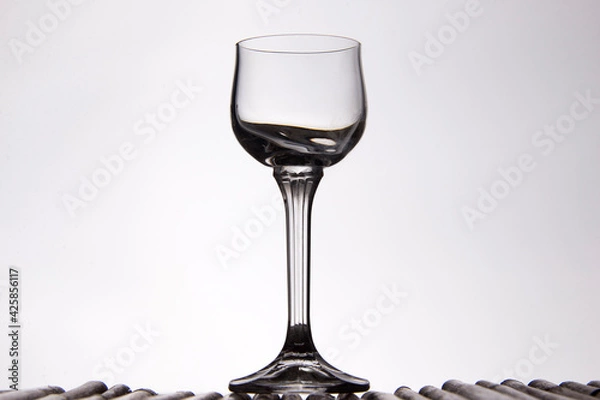 Obraz Silhouette of liqueur glass on white background 