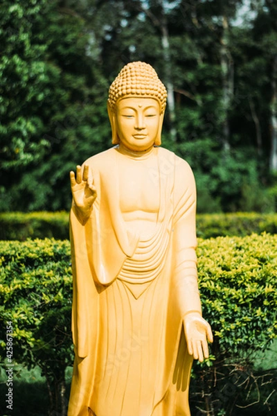 Obraz buddha statue yellow chinese temple
