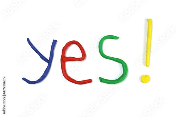Fototapeta Yes word made of colored plasticine isolated on white