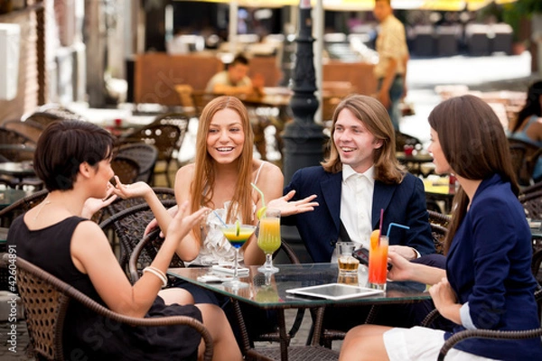 Obraz Group of friends enjoying cocktails