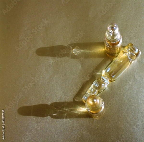 Obraz vitamine ampules on the silver background