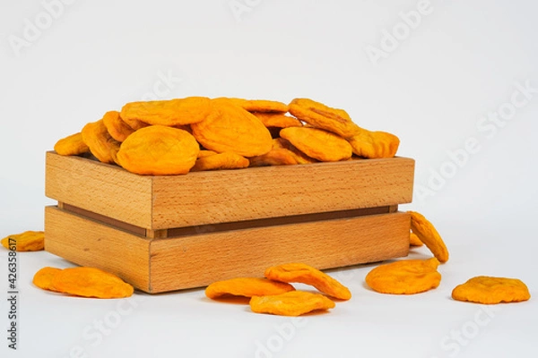 Obraz Dried fruits in wooden box . Free space for text. Products show for sale. Health food. Vegetarian Diet.  Studio photo. Copy space. Online shopping. Product for sale. Healthy food for dieting or snack.