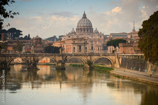 Fototapeta View of St. Peter's Basilica, Vatican City, Holy See, from a bridge over the Tiber river, Rome, Italy