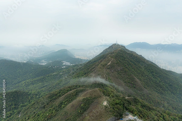 Fototapeta Beautiful misty morning landscape at Kowloon Peak, Hong Kong