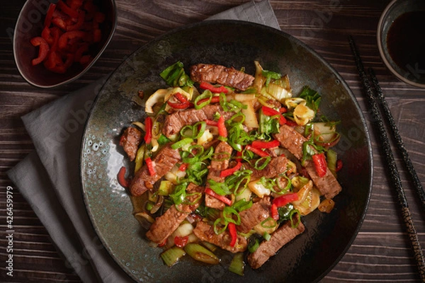 Obraz Asian Food: Homemade Beef and Pak Choy Stir Fry with Teriyaki Sauce, dark and moody style food photography