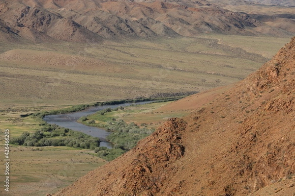 Fototapeta Beautiful landscape of Mongolia. Untouched nature in summer with grass and flowers.