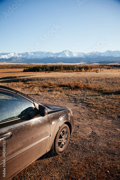 Fototapeta Auto trip to Kurai steppe in early autumn in Altay mountains