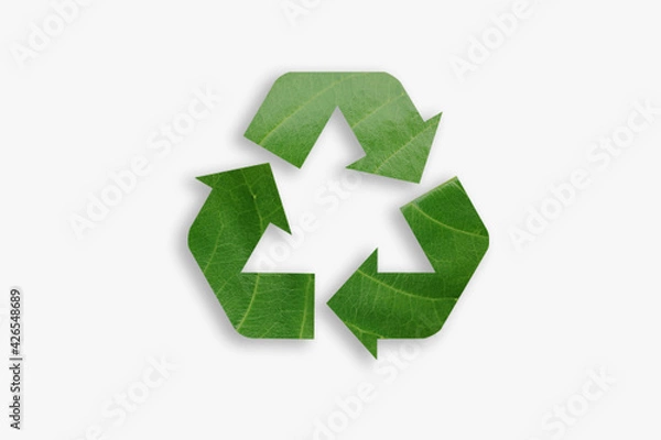 Fototapeta Recycling icon made from green leaves.On a white background. The concept of recycling, non-waste production, eco-plastic, eco fuel. Ecology and green environment concept