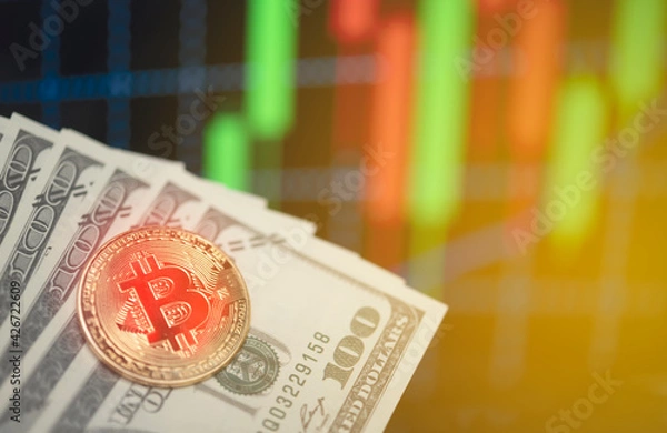 Fototapeta Bitcoin with dollar - investments, success and business ideas