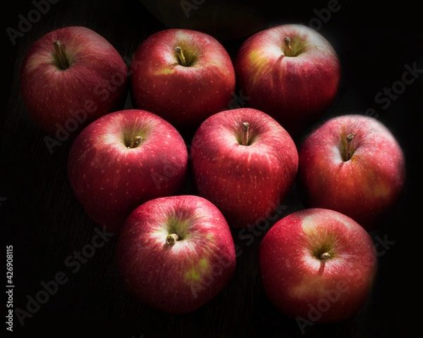 Obraz Red Apple on black background