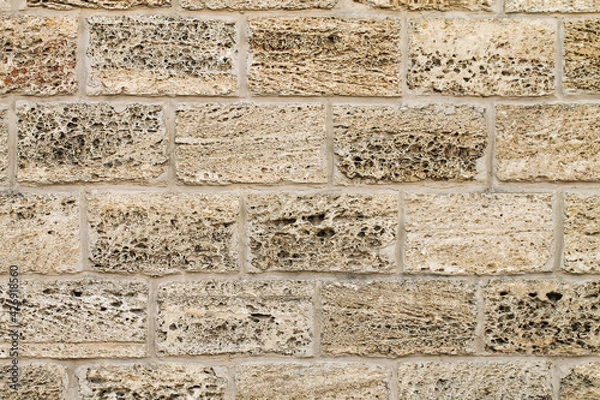 Obraz A wall built of shell rock. Brick texture.