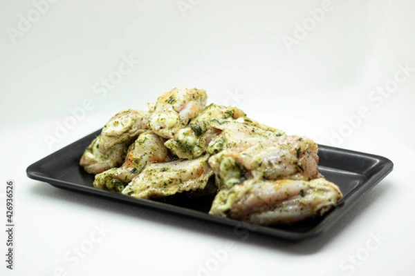 Obraz alas de pollo con salsa primavera