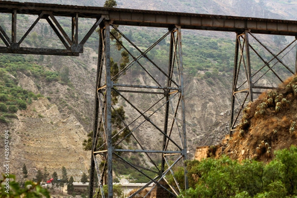 Fototapeta train bridge over two mountains