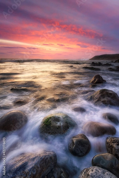 Obraz Light Path, vibrant sunset at beach 