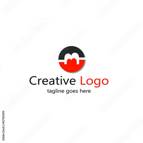 Fototapeta abstract logo letter M inside a circle in black and orange color