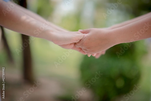 Fototapeta Nurses shook hands and conveyed synergy.